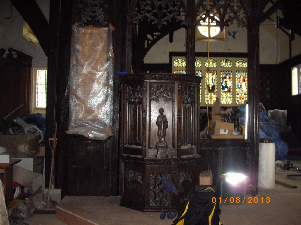 The Pulpit is put back in place